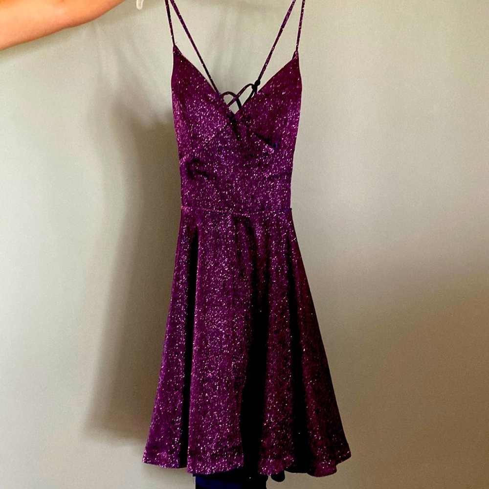 Purple semi formal dress. Worn once. Criss-cross open back.
